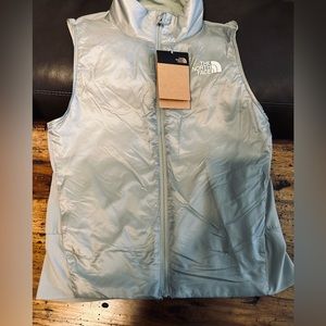 The North Face winter warm vest size small silver blue